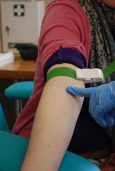 A Picture of blood samples being collected with At-Home Lab Test Service