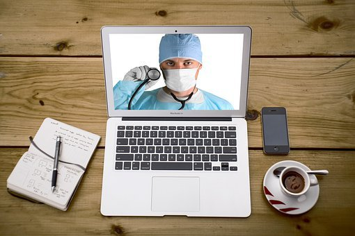 A picture of an online doctor in a consultation