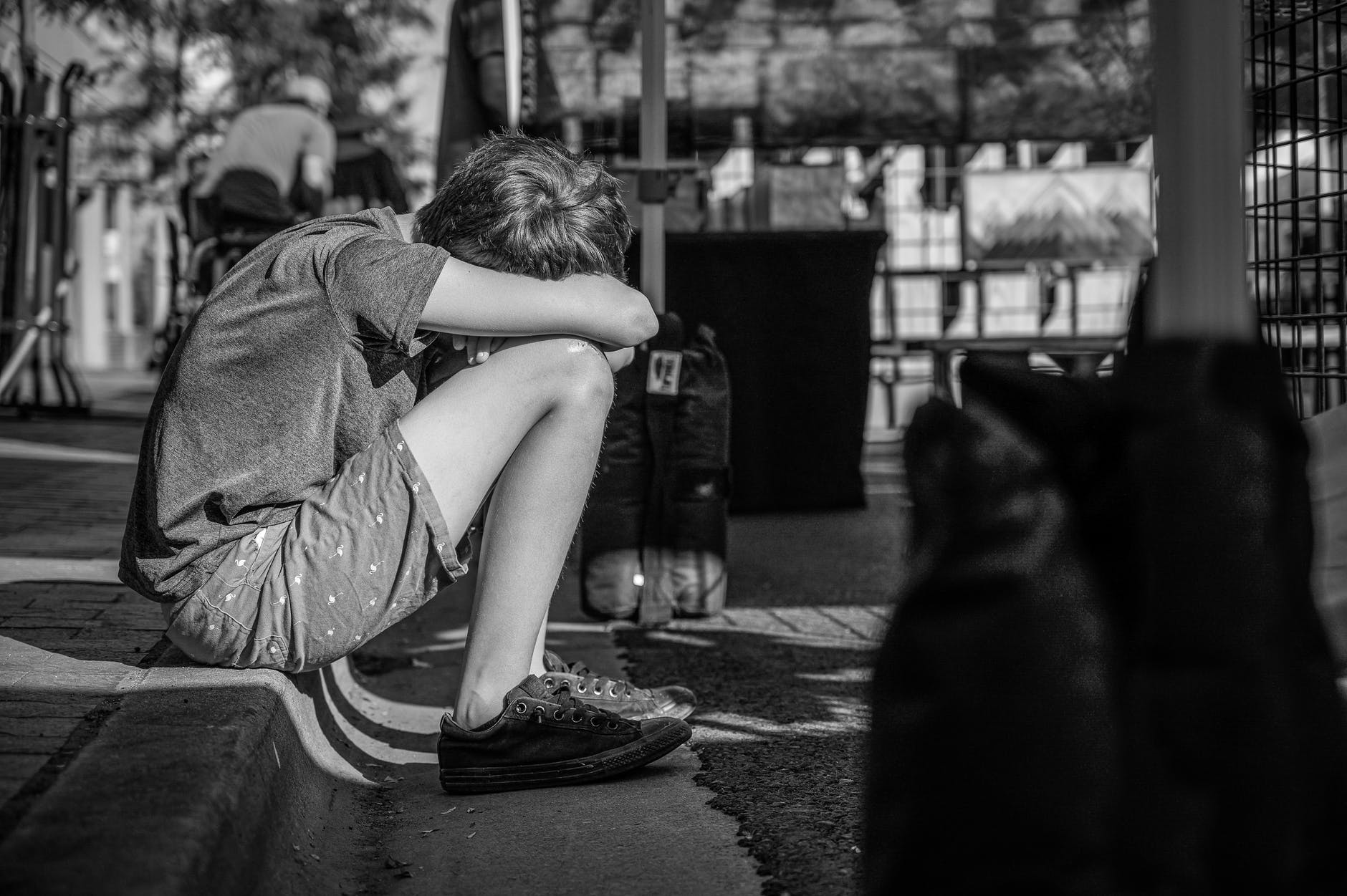 Kid sitting in depression