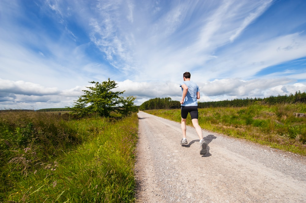 a person running on the road