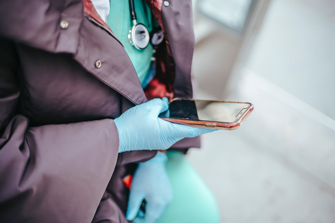 A doctor using smartphone