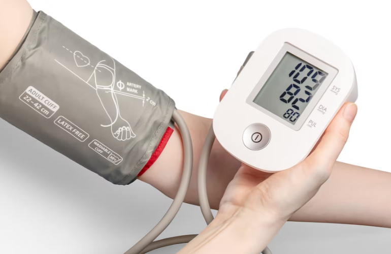 Person monitoring blood pressure.